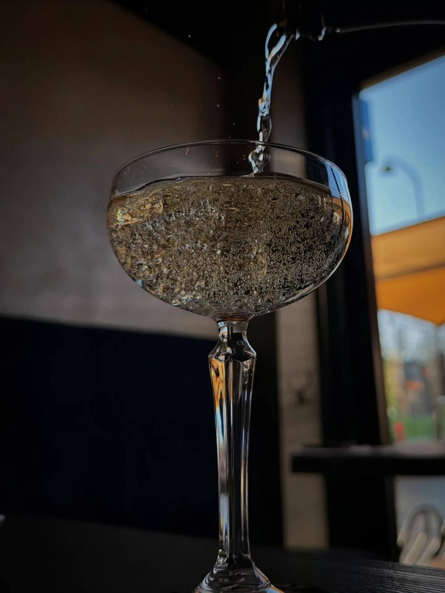 Champagne being poured into glasses